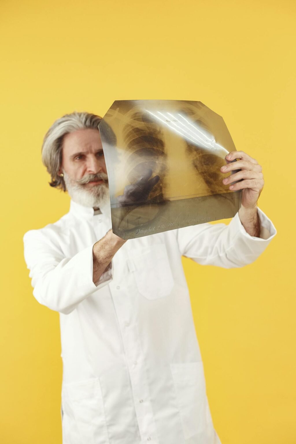 Doctor reviewing a chest X-ray as part of a diagnostic evaluation